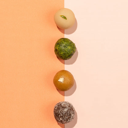 Mishtaa Assorted Nutty Bliss Box, a premium selection of healthy ladoos made with nuts and natural ingredients.
